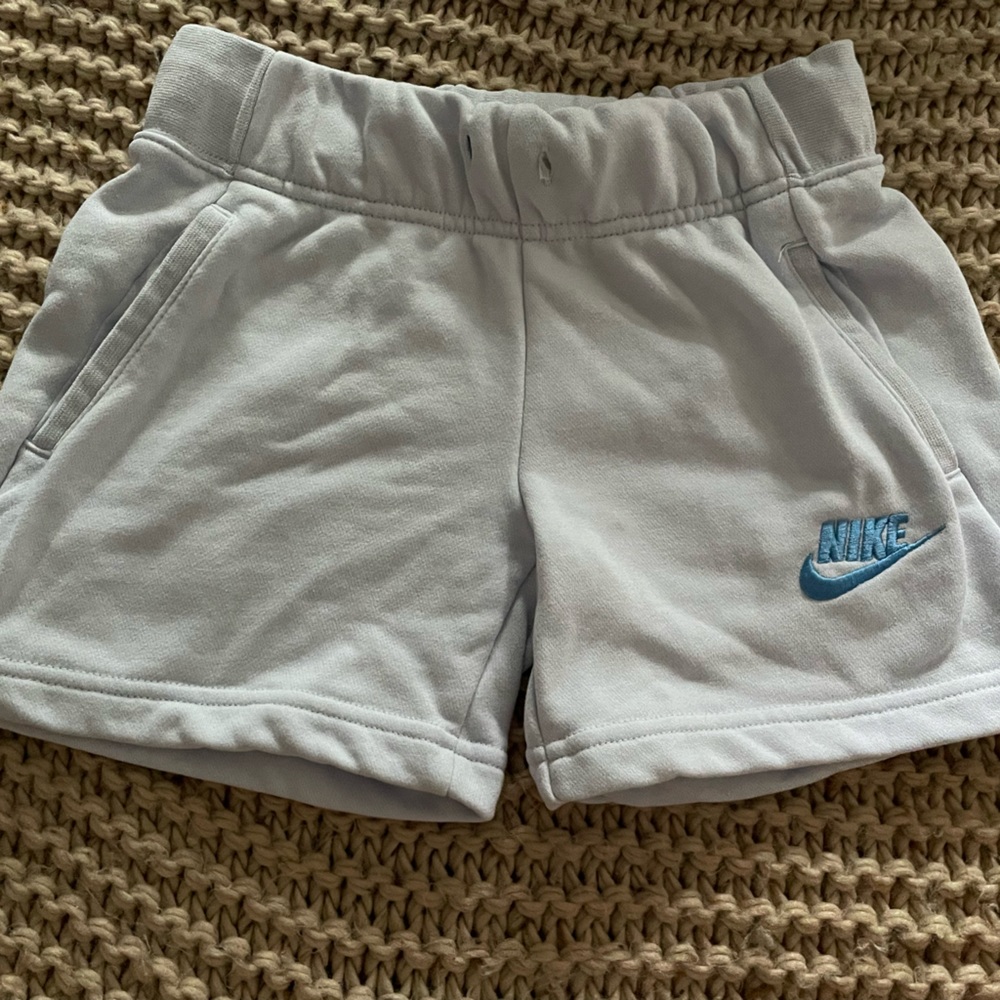 Small Light Blue Nike Shorts.